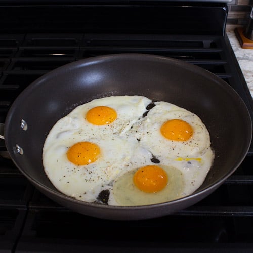 Eggs cracked in a frying pan