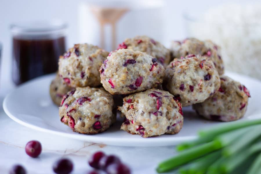cranberry chicken meatballs stacked on a plate