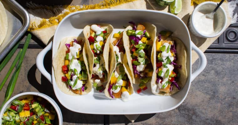 Fish Tacos with Mango Salsa and Spicy Sour Cream