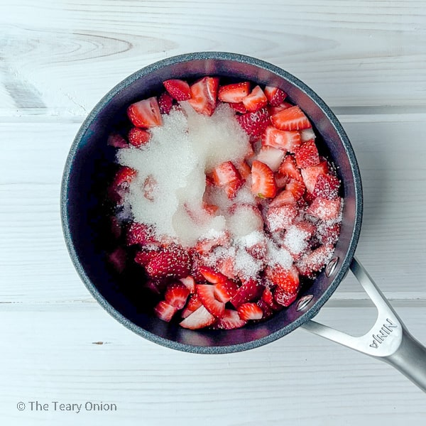 strawberries, sugar and lemon juice in a pan