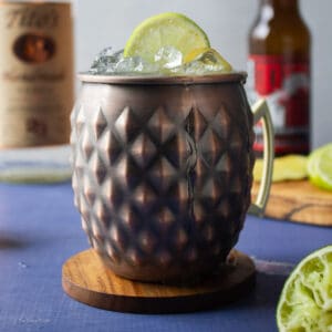 Side view of a moscow mule in a copper mug.